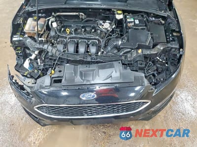 Zdjęcie 11 z 13 samochodu: 2018 FORD FOCUS SE VIN:1FADP3F21JL206201 - miniatura