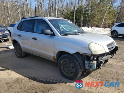 Czwarte zdjęcie samochodu z boku: 2005 HYUNDAI TUCSON GL VIN:KM8JM12B65U172400 - miniatura