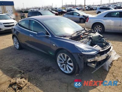 Czwarte zdjęcie samochodu z boku: 2018 TESLA MODEL 3 VIN:5YJ3E1EB3JF054815 - miniatura