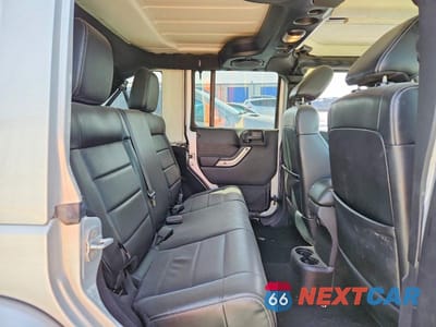 Zdjęcie 11 z 12 samochodu: 2012 JEEP WRANGLER UNLIMITED SAHARA VIN:1C4BJWEG6CL188752 - miniatura