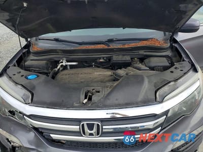 Zdjęcie 12 z 13 samochodu: 2016 HONDA PILOT EXLN VIN:5FNYF6H79GB104083 - miniatura