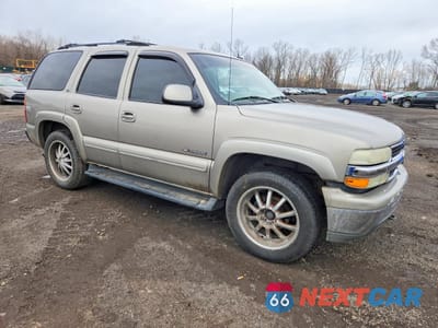 Czwarte zdjęcie samochodu z boku: 2002 CHEVROLET TAHOE K1500 VIN:1GNEK13ZX2R274375 - miniatura