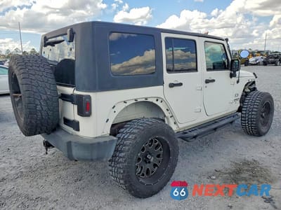 Trzecie zdjęcie samochodu z tyłu: 2009 JEEP WRANGLER UNLIMITED X VIN:1J4GA39139L770935 - miniatura