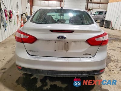 Zdjęcie 6 z 11 samochodu: 2014 FORD FOCUS SE VIN:1FADP3F21EL312511 - miniatura