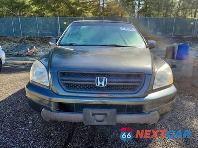 Piąte zdjęcie samochodu w środku: 2004 HONDA PILOT EXL VIN:2HKYF18764H609224 - miniatura