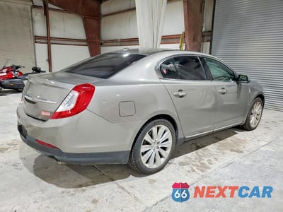 Trzecie zdjęcie samochodu z tyłu: 2015 LINCOLN MKS VIN:1LNHL9FT6FG607757 - miniatura