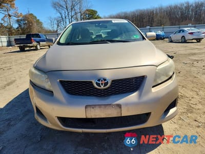 Piąte zdjęcie samochodu w środku: 2010 TOYOTA COROLLA LE VIN:2T1BU4EE2AC228906 - miniatura