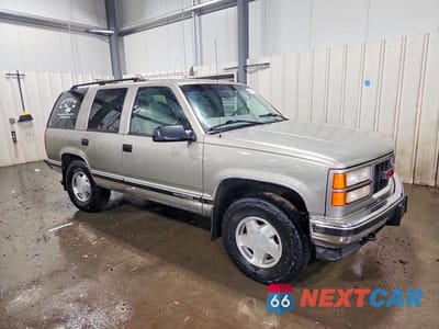 Czwarte zdjęcie samochodu z boku: 1998 GMC YUKON VIN:1GKEK13R3WJ707861 - miniatura