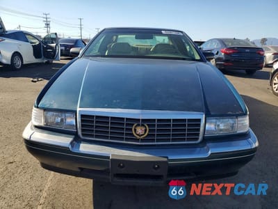 Piąte zdjęcie samochodu w środku: 1994 CADILLAC ELDORADO VIN:1G6EL12Y0RU615792 - miniatura