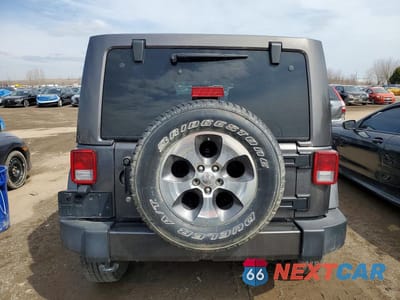Zdjęcie 6 z 12 samochodu: 2018 JEEP WRANGLER UNLIMITED SAHARA VIN:1C4BJWEG4JL900169 - miniatura