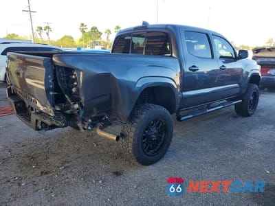 Trzecie zdjęcie samochodu z tyłu: 2023 TOYOTA TACOMA SR VIN:3TYAX5GN5PT080468 - miniatura