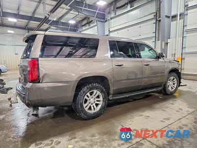 Trzecie zdjęcie samochodu z tyłu: 2016 CHEVROLET SUBURBAN K1500 LT VIN:1GNSKHKC3GR430952 - miniatura
