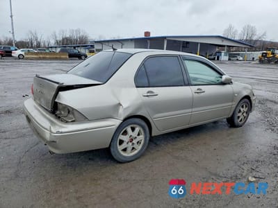 Trzecie zdjęcie samochodu z tyłu: 2002 MITSUBISHI LANCER LS VIN:JA3AJ36E22U064573 - miniatura