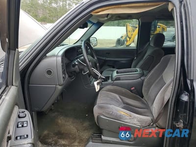 Zdjęcie 7 z 11 samochodu: 2003 GMC NEW SIERRA K1500 VIN:1GTEK19T13E325671 - miniatura