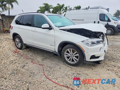 Czwarte zdjęcie samochodu z boku: 2015 BMW X5 SDRIVE35I VIN:5UXKR2C5XF0H36603 - miniatura