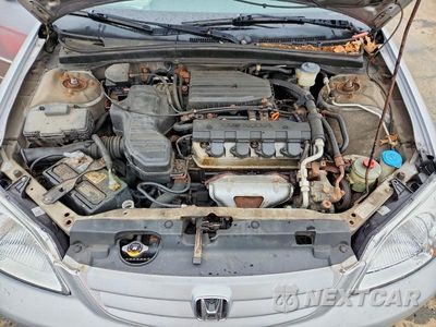 Zdjęcie 11 z 12 samochodu: 2003 HONDA CIVIC LX VIN:2HGES16543H579892 - miniatura