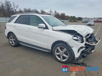 Czwarte zdjęcie samochodu z boku: 2017 MERCEDES-BENZ GLE 350 4MATIC VIN:4JGDA5HB4HA975927 - miniatura