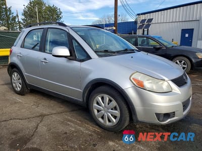 Czwarte zdjęcie samochodu z boku: 2010 SUZUKI SX4 VIN:JS2YB5A35A6301337 - miniatura