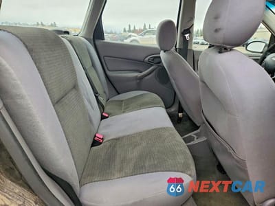 Zdjęcie 10 z 12 samochodu: 2004 FORD FOCUS SE VIN:1FAFP36354W153894 - miniatura