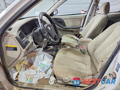 Zdjęcie 7 z 12 samochodu: 2003 HYUNDAI ELANTRA GLS VIN:KMHDN45D13U514969 - miniatura