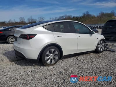 Trzecie zdjęcie samochodu z tyłu: 2023 TESLA MODEL Y VIN:7SAYGDEF7PA048965 - miniatura