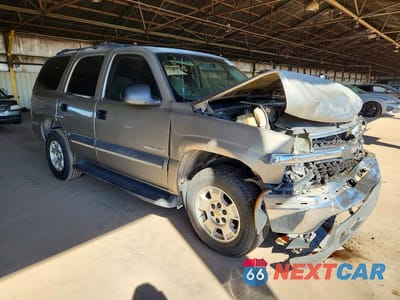 Czwarte zdjęcie samochodu z boku: 2003 CHEVROLET TAHOE C1500 VIN:1GNEC13V83R263922 - miniatura