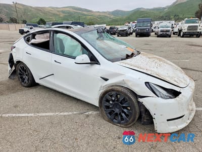 Czwarte zdjęcie samochodu z boku: 2020 TESLA MODEL Y VIN:5YJYGDEE5LF059285 - miniatura