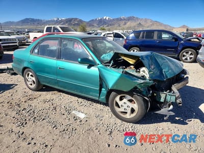 Czwarte zdjęcie samochodu z boku: 1998 TOYOTA COROLLA VE VIN:1NXBR18E7WZ039766 - miniatura