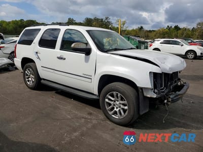 Czwarte zdjęcie samochodu z boku: 2011 CHEVROLET TAHOE C1500 LTZ VIN:1GNSCCE07BR186166 - miniatura