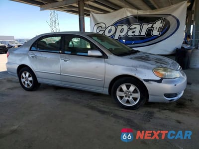 Czwarte zdjęcie samochodu z boku: 2005 TOYOTA COROLLA LE VIN:1NXBR30E95Z454397 - miniatura