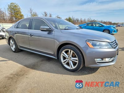 Czwarte zdjęcie samochodu z boku: 2015 VOLKSWAGEN PASSAT SE VIN:1VWBT7A3XFC010413 - miniatura