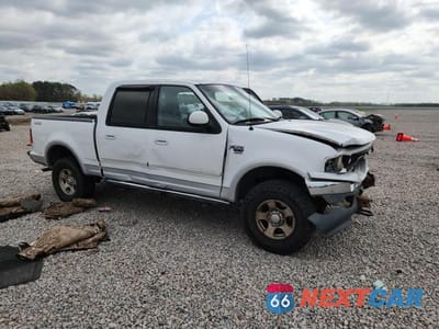 Czwarte zdjęcie samochodu z boku: 2002 FORD F150 SUPERCREW VIN:1FTRW08L12KD39197 - miniatura