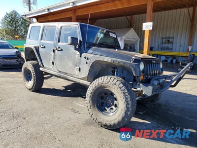 Czwarte zdjęcie samochodu z boku: 2008 JEEP WRANGLER UNLIMITED RUBICON VIN:1J4GA69128L575733 - miniatura