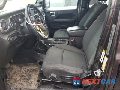 Zdjęcie 7 z 13 samochodu: 2019 JEEP WRANGLER UNLIMITED SAHARA VIN:1C4HJXEN0KW686859 - miniatura