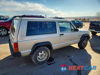 Trzecie zdjęcie samochodu z tyłu: 1996 JEEP CHEROKEE SE VIN:1J4FJ27S9TL123545 - miniatura