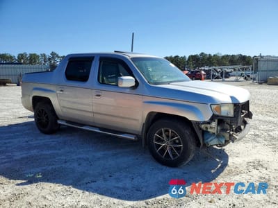 Czwarte zdjęcie samochodu z boku: 2007 HONDA RIDGELINE RTL VIN:2HJYK16567H530898 - miniatura