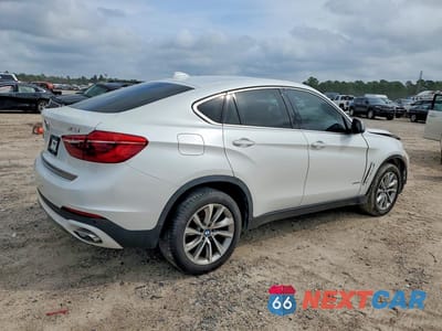 Trzecie zdjęcie samochodu z tyłu: 2019 BMW X6 SDRIVE35I VIN:5UXKU0C52K0S97665 - miniatura