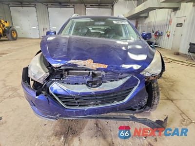 Piąte zdjęcie samochodu w środku: 2011 HYUNDAI TUCSON GLS VIN:KM8JU3AC9BU272685 - miniatura