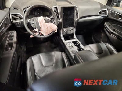 Zdjęcie 8 z 12 samochodu: 2021 FORD EDGE TITANIUM VIN:2FMPK4K98MBA41567 - miniatura