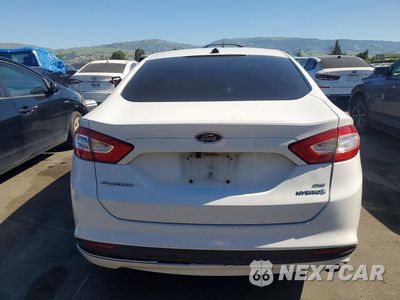 Zdjęcie 6 z 12 samochodu: 2013 FORD FUSION SE HYBRID VIN:3FA6P0LU9DR380522 - miniatura