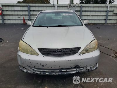 Piąte zdjęcie samochodu w środku: 2004 TOYOTA CAMRY LE VIN:JTDBE32K640272195 - miniatura