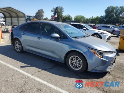 Czwarte zdjęcie samochodu z boku: 2022 TOYOTA COROLLA HYBRID LE VIN:JTDEAMDE3NJ057178 - miniatura