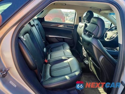 Zdjęcie 10 z 13 samochodu: 2016 LINCOLN MKZ HYBRID VIN:3LN6L2LU7GR624718 - miniatura