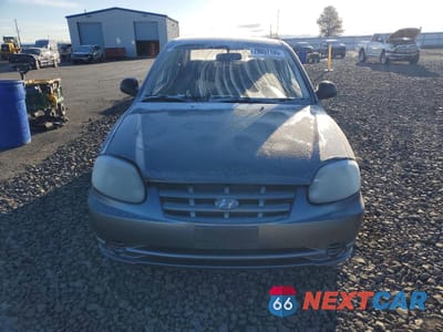 Piąte zdjęcie samochodu w środku: 2003 HYUNDAI ACCENT BASE VIN:KMHCF35C63U271055 - miniatura