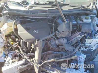 Zdjęcie 12 z 13 samochodu: 2014 MAZDA 5 TOURING VIN:JM1CW2CLXE0172816 - miniatura