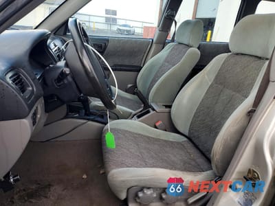 Zdjęcie 7 z 13 samochodu: 1999 SUBARU FORESTER L VIN:JF1SF6351XH723035 - miniatura