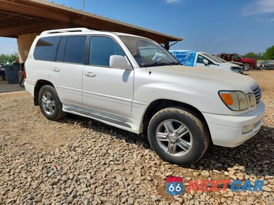 Czwarte zdjęcie samochodu z boku: 2006 LEXUS LX 470 BASE VIN:JTJHT00W464011385 - miniatura