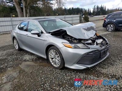 Czwarte zdjęcie samochodu z boku: 2018 TOYOTA CAMRY HYBRID XLE VIN:4T1B21HK6JU505013 - miniatura