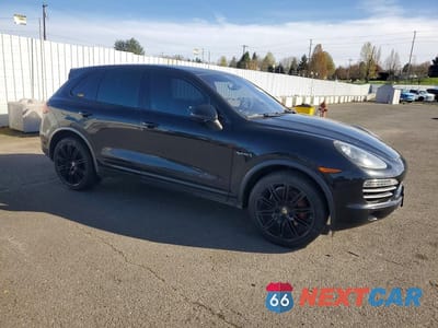 Czwarte zdjęcie samochodu z boku: 2012 PORSCHE CAYENNE S HYBRID VIN:WP1AE2A24CLA90255 - miniatura