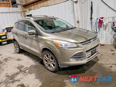 Czwarte zdjęcie samochodu z boku: 2014 FORD ESCAPE TITANIUM VIN:1FMCU9JX1EUB09256 - miniatura